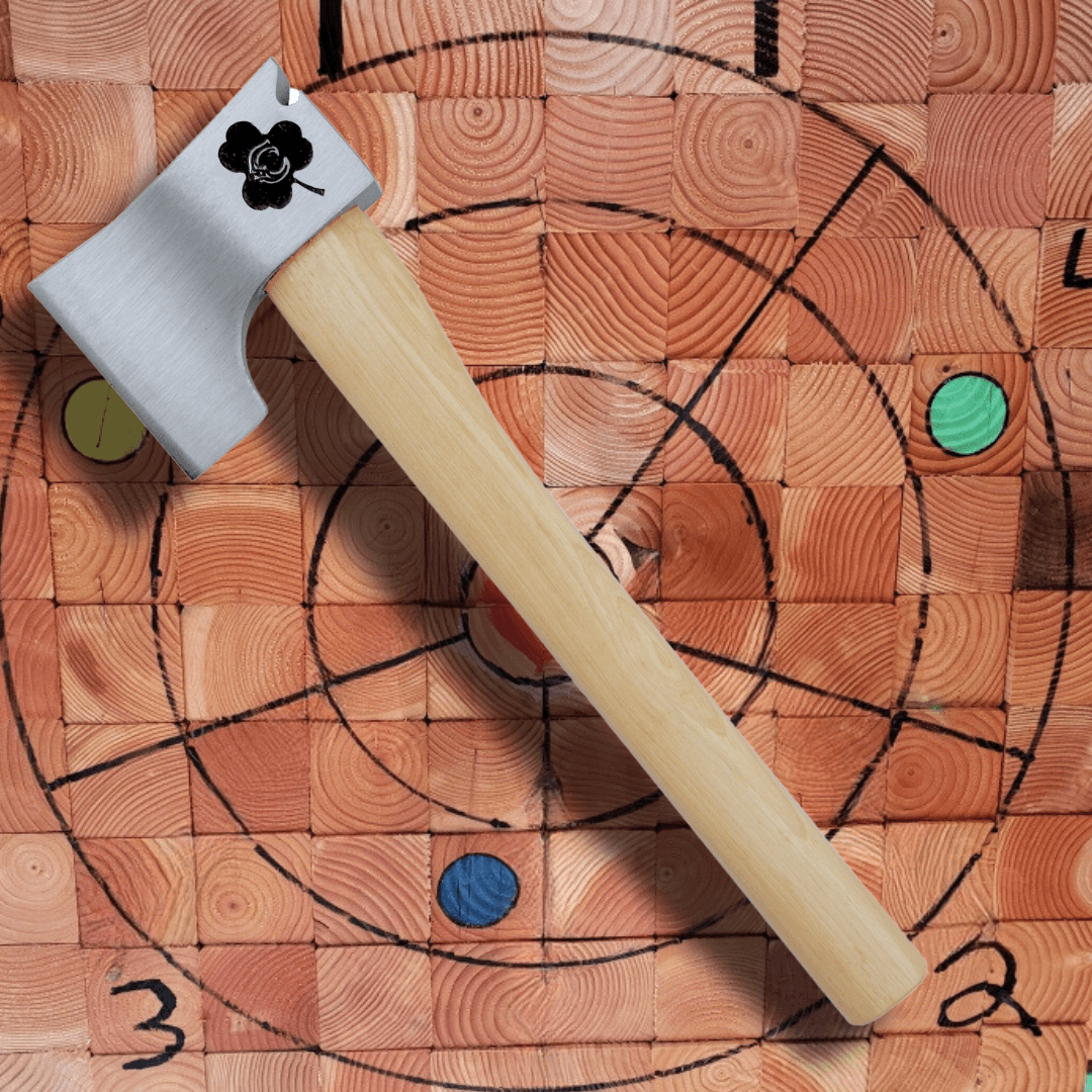The Chieftain Pro throwing axe resting on an end-grain wooden throwing target