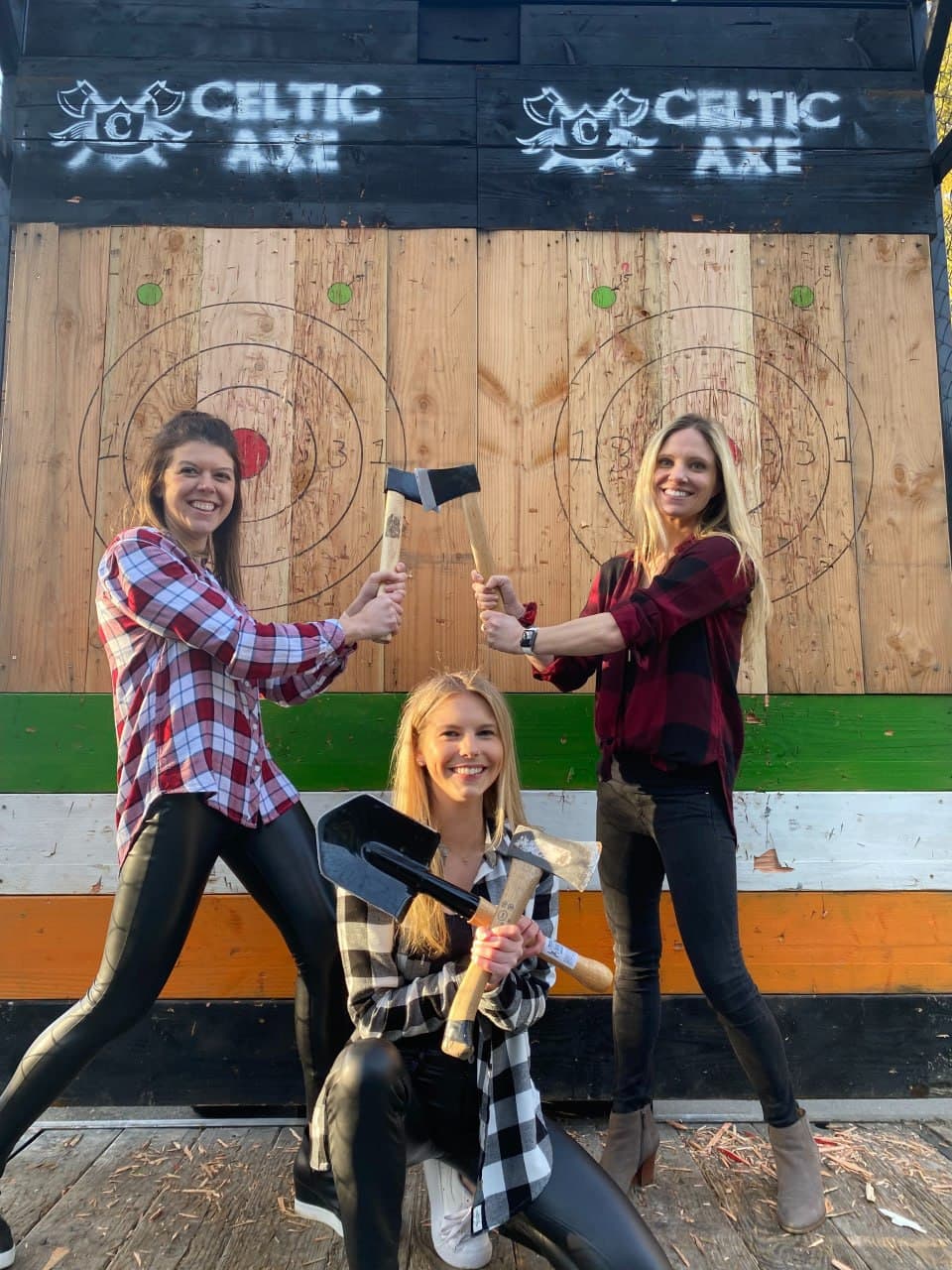 Corporate team at axe throwing venue